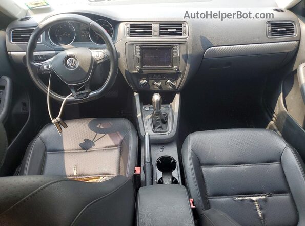 3VWD67AJ3GM360089 2016 VOLKSWAGEN JETTA Gray Vista del salpicadero