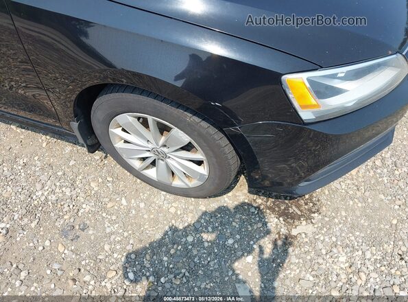 3VWD67AJ5GM318152 2016 VOLKSWAGEN JETTA Black Вид спереду