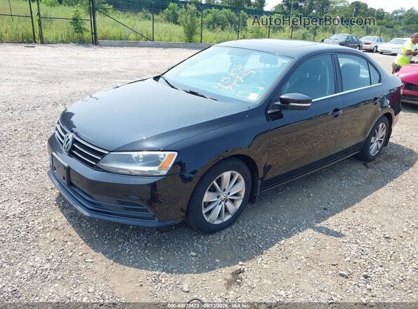 3VWD67AJ5GM318152 2016 VOLKSWAGEN JETTA Black Передня ліва чверть