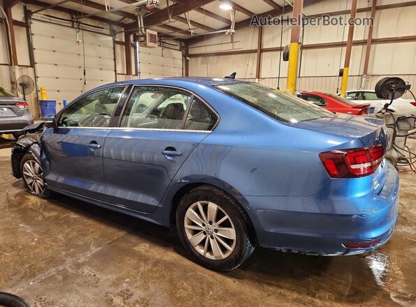 3VWD67AJ5GM415593 2016 VOLKSWAGEN JETTA Blue Tył lewy