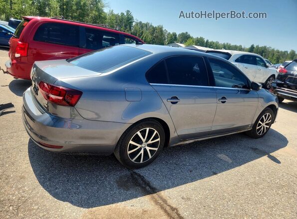 3VWD67AJ9GM369136 2016 VOLKSWAGEN JETTA Gray Trasero derecho