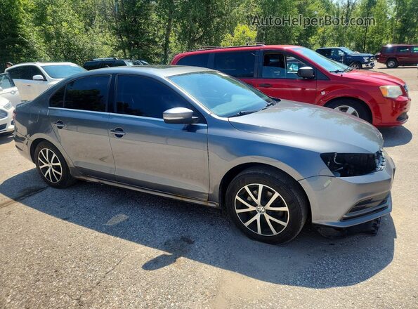3VWD67AJ9GM369136 2016 VOLKSWAGEN JETTA Gray Delantero derecho