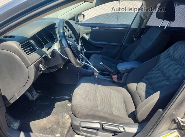 3VWD67AJ9GM369136 2016 VOLKSWAGEN JETTA Gray Vista interior delantera