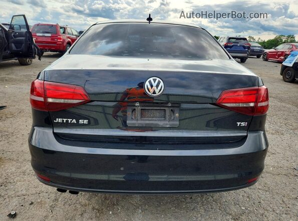 3VWDB7AJ1HM272879 2017 VOLKSWAGEN JETTA Black Rear view