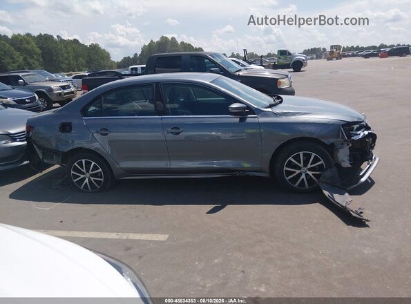3VWDB7AJ1HM410632 2017 VOLKSWAGEN JETTA Gray Vista interior trasera