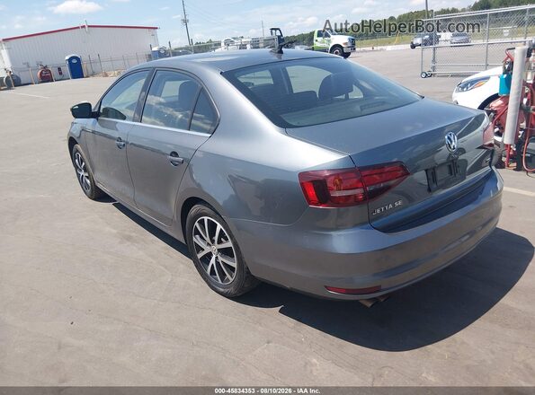 3VWDB7AJ1HM410632 2017 VOLKSWAGEN JETTA Gray Trasero izquierdo