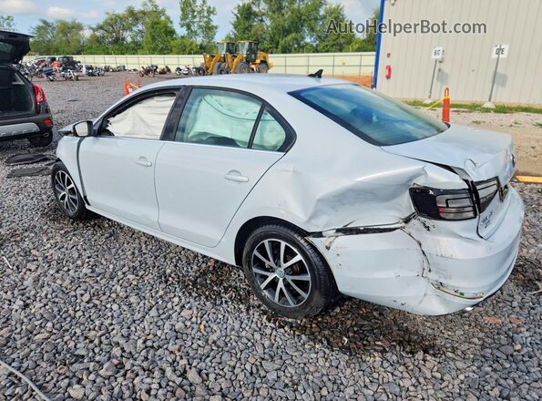 3VWDB7AJ3JM221826 2018 VOLKSWAGEN JETTA White Trasero izquierdo