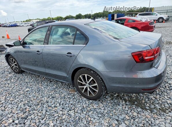 3VWDB7AJ3JM260139 2018 VOLKSWAGEN JETTA Teal Հետևի ձախ