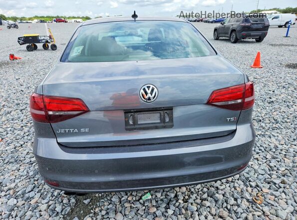 3VWDB7AJ3JM260139 2018 VOLKSWAGEN JETTA Teal Հետևի տեսք
