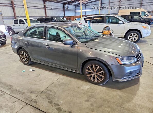 3VWDB7AJ4HM279244 2017 VOLKSWAGEN JETTA Gray Przód prawy