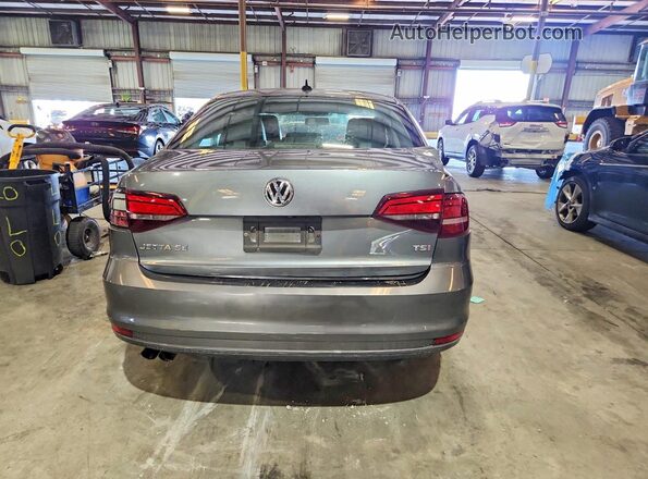 3VWDB7AJ4HM279244 2017 VOLKSWAGEN JETTA Gray Widok z tyłu