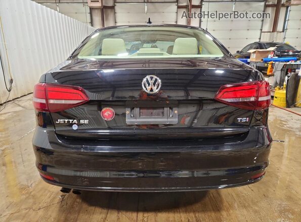 3VWDB7AJ4HM354315 2017 VOLKSWAGEN JETTA Black Вид ззаду