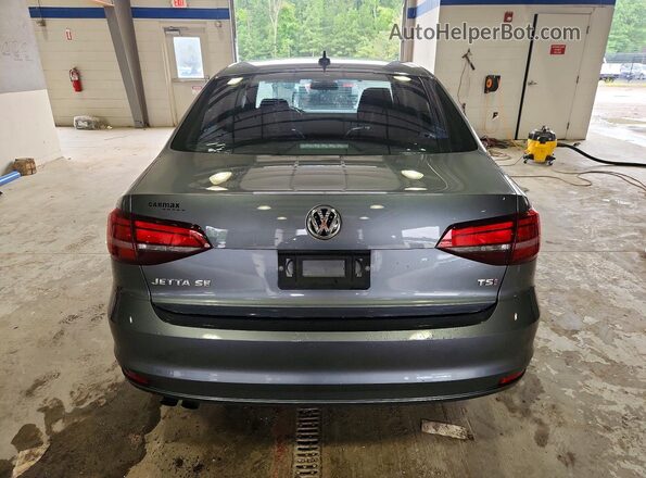3VWDB7AJ4JM246671 2018 VOLKSWAGEN JETTA Gray Вид ззаду