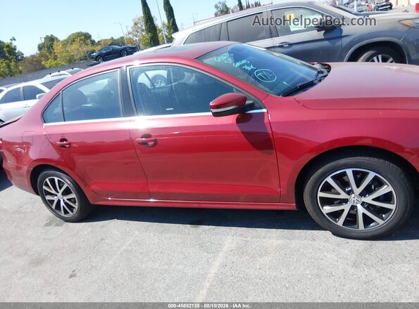 3VWDB7AJ5HM403084 2017 VOLKSWAGEN JETTA Burgundy Rear interior view