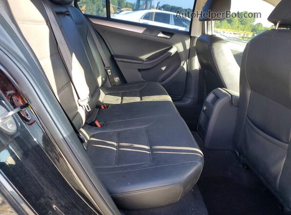 3VWDB7AJ8HM231164 2017 VOLKSWAGEN JETTA Black Vista de los asientos traseros