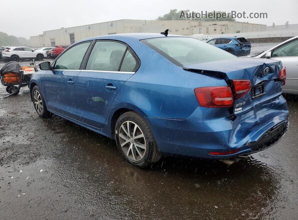 3VWDB7AJ8HM394896 2017 VOLKSWAGEN JETTA Blue Trasero izquierdo