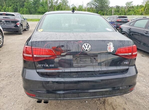 3VWDB7AJ8HM396325 2017 VOLKSWAGEN JETTA Black Widok z tyłu