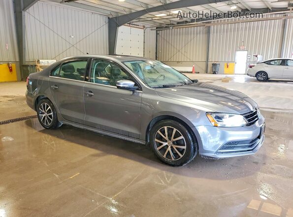 3VWDB7AJ8HM413379 2017 VOLKSWAGEN JETTA Gray Front right