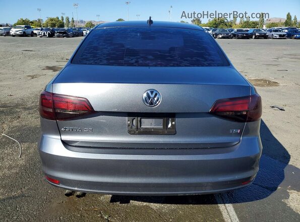 3VWDB7AJ9HM299473 2017 VOLKSWAGEN JETTA Gray Vista trasera