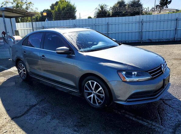 3VWDB7AJ9HM299473 2017 VOLKSWAGEN JETTA Gray Delantero derecho