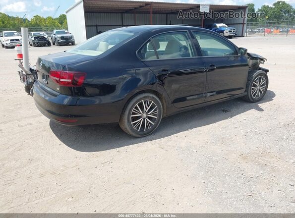 3VWDB7AJ9JM209647 2018 VOLKSWAGEN JETTA Black Tył prawy