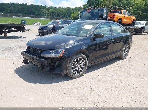 3VWDB7AJ9JM209647 2018 VOLKSWAGEN JETTA Black Przód lewy