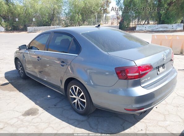 3VWDB7AJXJM263071 2018 VOLKSWAGEN JETTA Gray Rear left