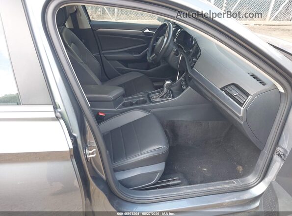 3VWEM7BU3RM081568 2024 VOLKSWAGEN JETTA Gray Widok wnętrza z przodu