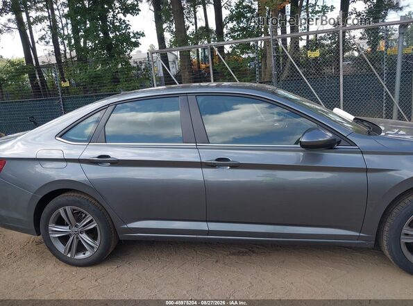 3VWEM7BU3RM081568 2024 VOLKSWAGEN JETTA Gray Widok wnętrza z tyłu
