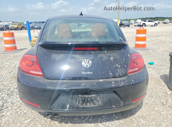 3VWF17AT2GM634729 2016 VOLKSWAGEN BEETLE Black უკანა ხედი