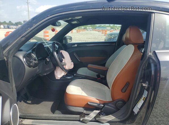 3VWF17AT2GM634729 2016 VOLKSWAGEN BEETLE Black წინა სალონის ხედი