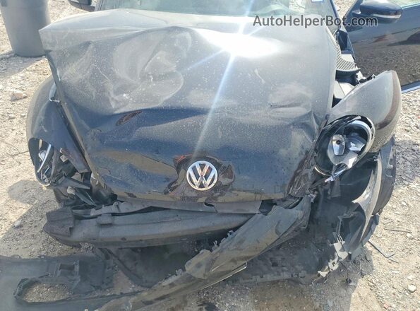 3VWF17AT2GM634729 2016 VOLKSWAGEN BEETLE Black უკანა სალონის ხედი