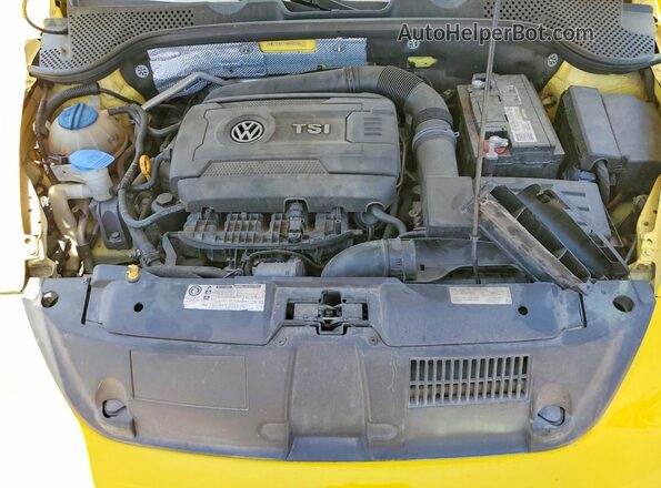 3VWF17AT7GM605565 2016 VOLKSWAGEN BEETLE Yellow Widok wnętrza z tyłu