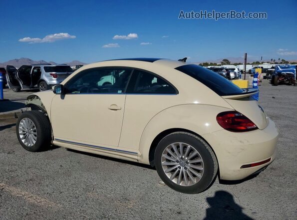 3VWFD7AT7KM703186 2019 VOLKSWAGEN BEETLE Cream Rear left