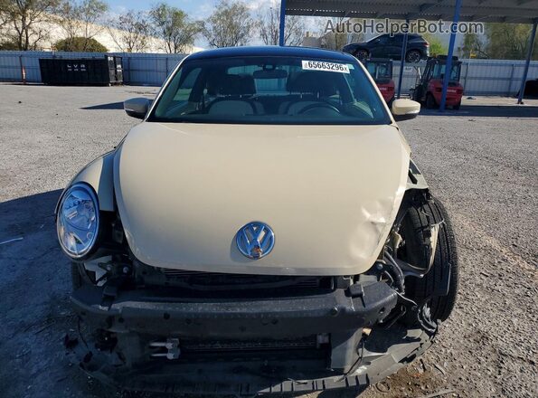 3VWFD7AT7KM703186 2019 VOLKSWAGEN BEETLE Cream Front view