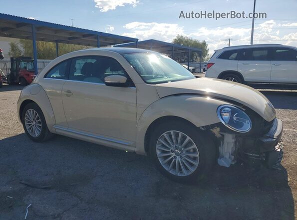 3VWFD7AT7KM703186 2019 VOLKSWAGEN BEETLE Cream Front right