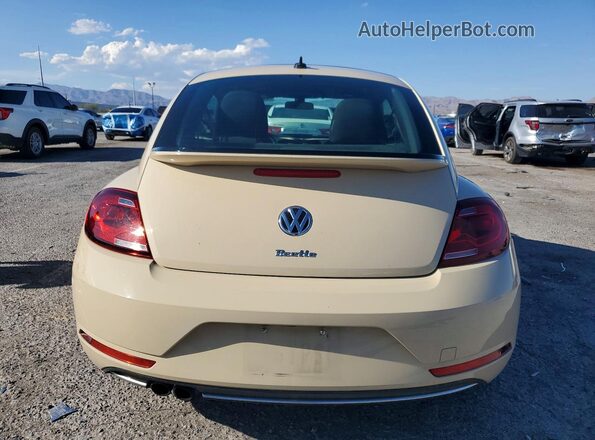 3VWFD7AT7KM703186 2019 VOLKSWAGEN BEETLE Cream Rear view