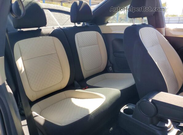 3VWFD7AT7KM703186 2019 VOLKSWAGEN BEETLE Cream Rear seats view