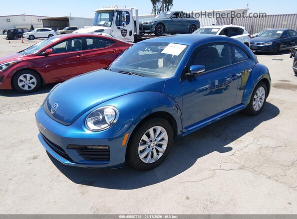 3VWFD7ATXKM713260 2019 VOLKSWAGEN BEETLE Blue Vista tres cuartos delantera izquierda