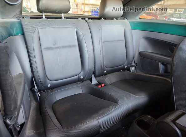 3VWJ17AT2HM618655 2017 VOLKSWAGEN BEETLE Green Vista de los asientos traseros