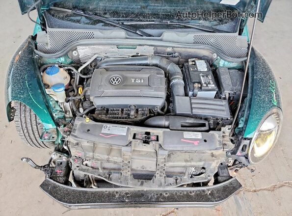 3VWJ17AT2HM618655 2017 VOLKSWAGEN BEETLE Green Vista interior trasera