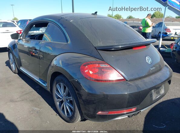 3VWJ17AT7HM615217 2017 VOLKSWAGEN BEETLE Black Tył lewy