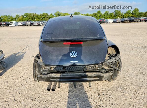 3VWJ17AT9HM618202 2017 VOLKSWAGEN BEETLE Black უკანა ხედი