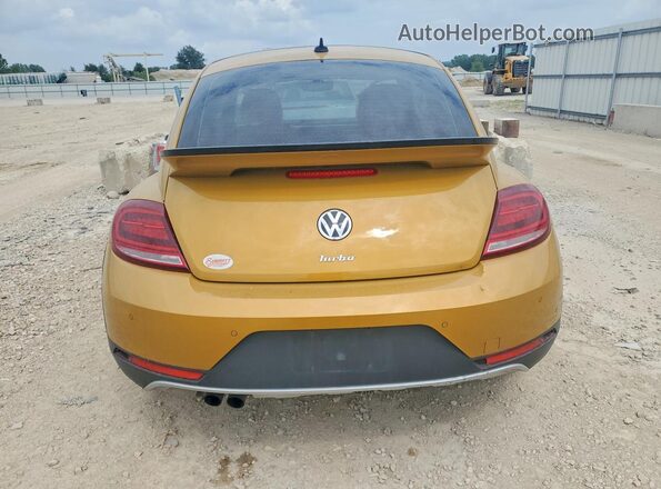 3VWS17AT1HM615816 2017 VOLKSWAGEN BEETLE Gold Vista trasera