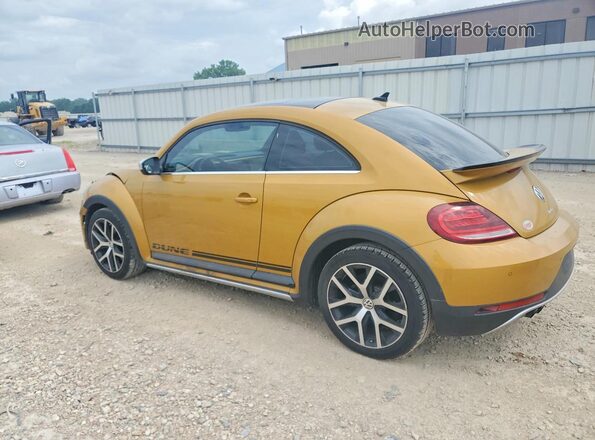 3VWS17AT1HM615816 2017 VOLKSWAGEN BEETLE Gold Trasero izquierdo