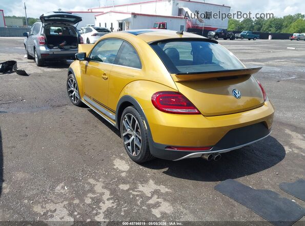 3VWS17AT3HM624632 2017 VOLKSWAGEN BEETLE Yellow Trasero izquierdo