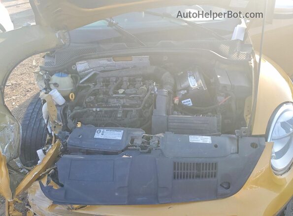 3VWS17AT4GM634276 2016 VOLKSWAGEN BEETLE Gold Vista interior trasera