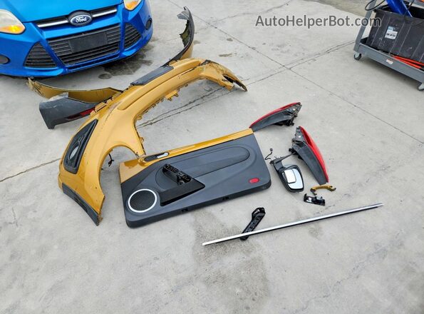 3VWS17AT8GM634295 2016 VOLKSWAGEN BEETLE Gold Vista del compartimento del motor