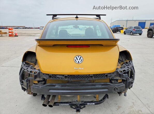 3VWS17AT8GM634295 2016 VOLKSWAGEN BEETLE Gold Vista trasera
