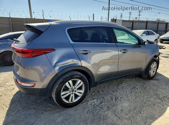 KNDPM3AC8K7559075 2019 KIA SPORTAGE Silver Delantero derecho